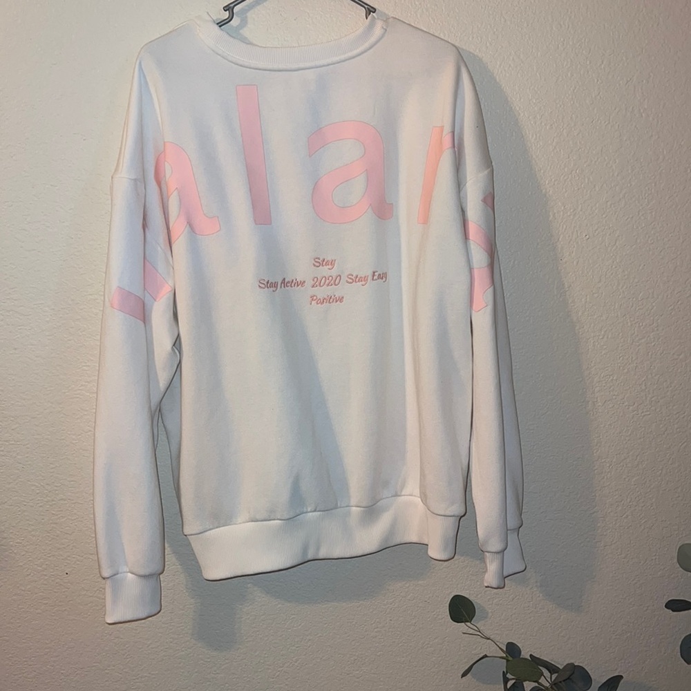 HALARA White Crewneck Sweatshirt with Pink Logo